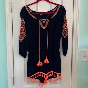 Altar’d State navy romper with orange trim tassels.  Size small